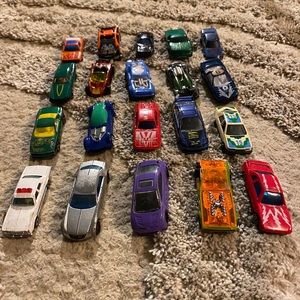 20 vehicles hot wheels and others